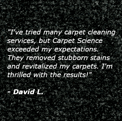 Grey nylon fiber carpet texture. Acrylic fiber seamless background. Cut pile saxony floor rug fabric textile.